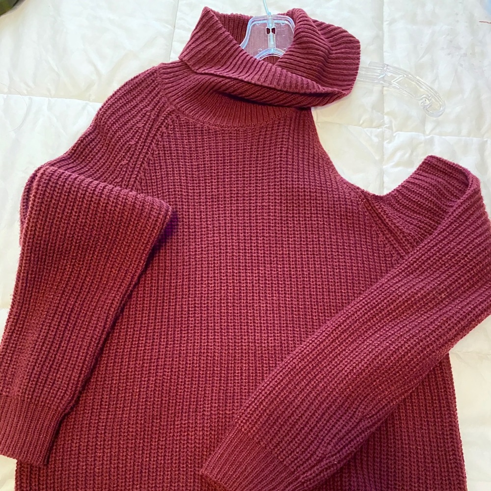Burgundy sweater, off one shoulder